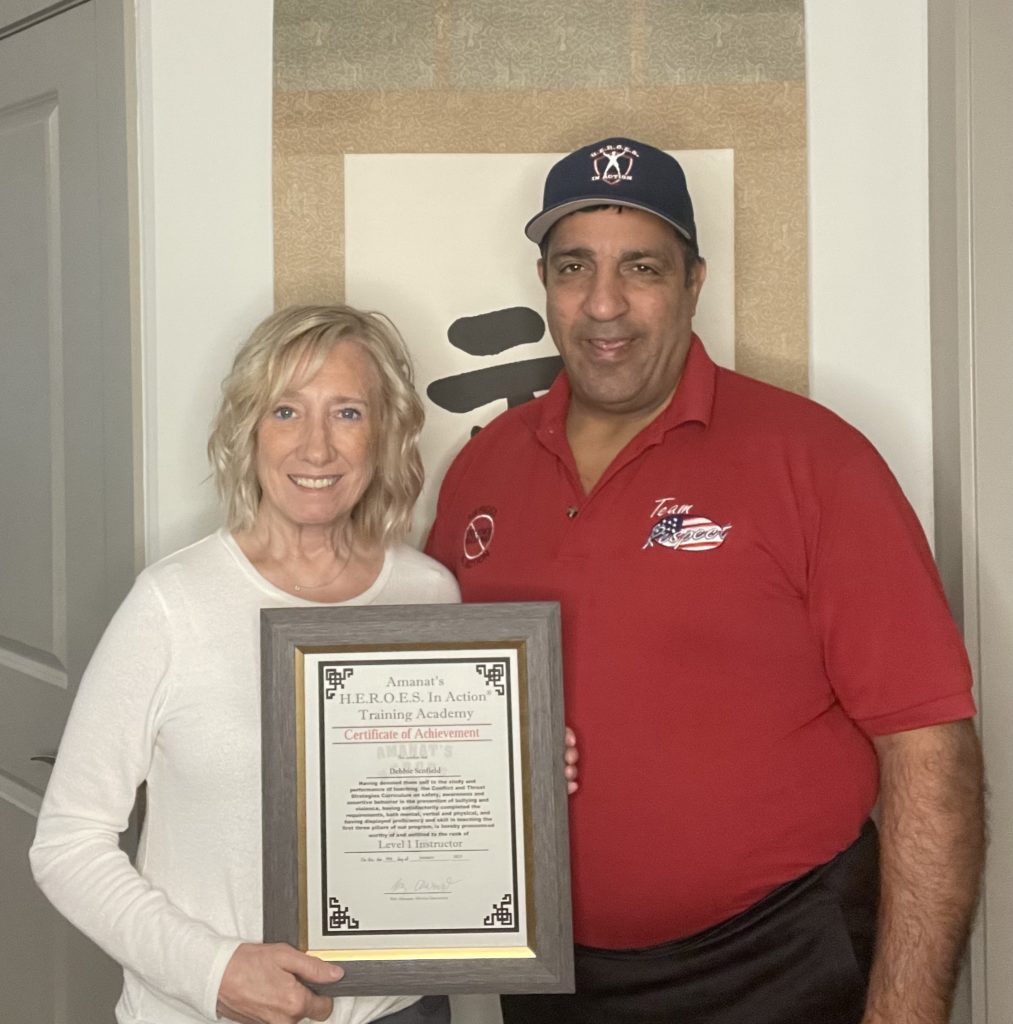 Debbie receiving certification certificate